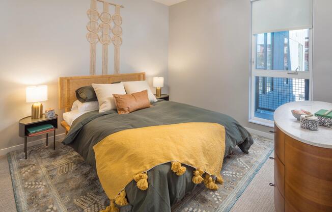 Spacious bedrooms with custom roller shades.