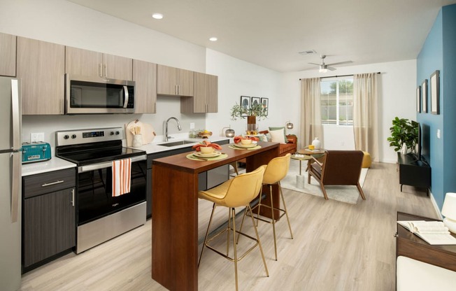 a kitchen and dining area in a 555 waverly unit