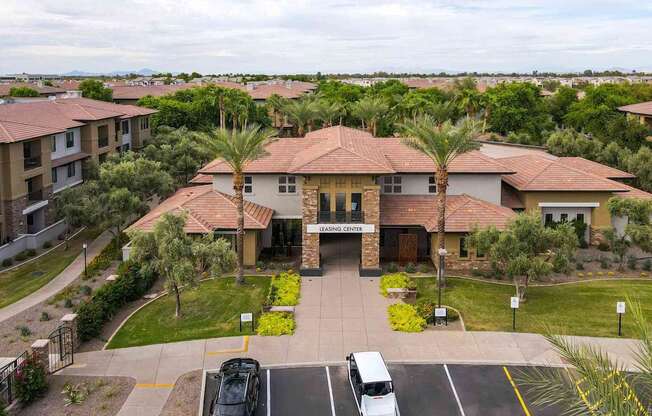 A building with a parking lot in front of it. at The Laurel Apartments, Chandler Arizona