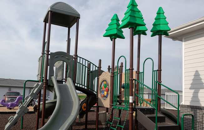 a playground with a slide and other play equipment