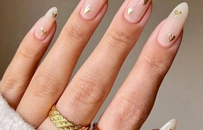 a clean white manicure with gold dots on nails at Allied Harbor Point, Baltimore, 21231