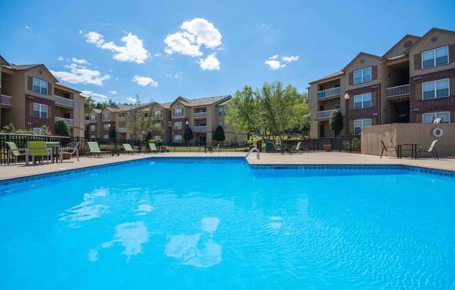 Swimming pool with the apartment complex in the background