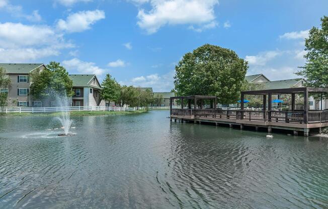a house next to a body of water