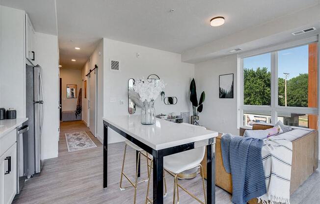 Open concept living room and kitchen lots of natural light