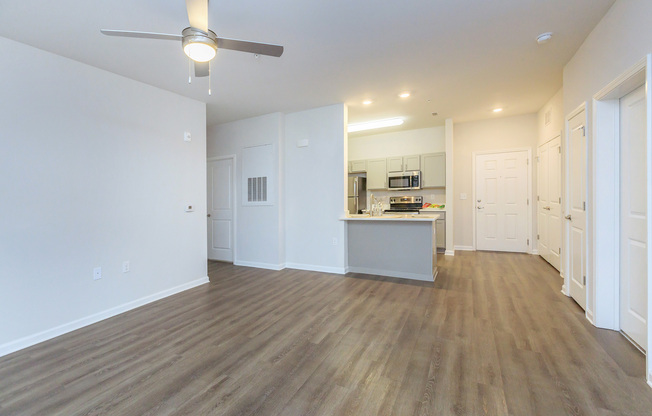 a kitchen with a wood floor