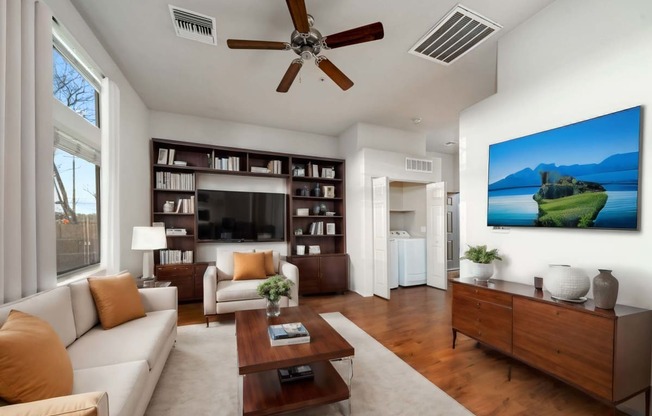 Living Room with Washer and Dryer at Avilla Preserve Apartment Homes in Tucson Arizona