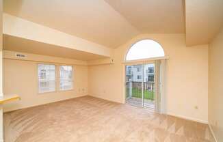 Enlarged living room with cathedral ceiling