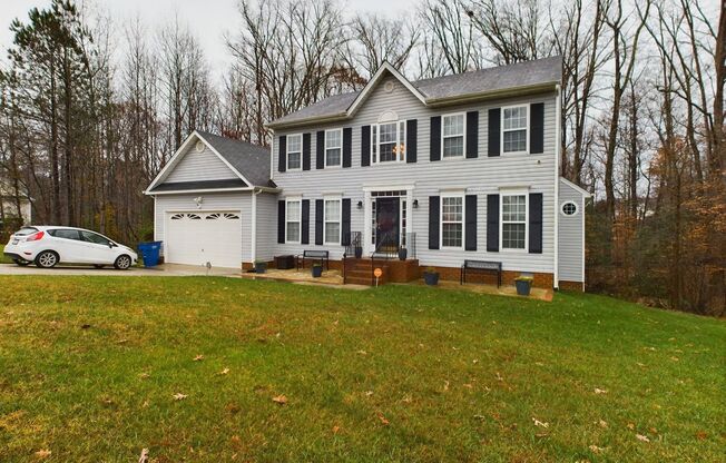 Beautiful 4-Bedroom Colonial Home with Sunroom, Deck, and Garage available February 1st!