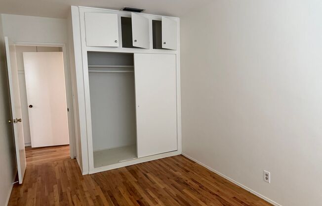 Fresh 2 bedroom 1 bath upper unit ready to rent! Small garage included!.