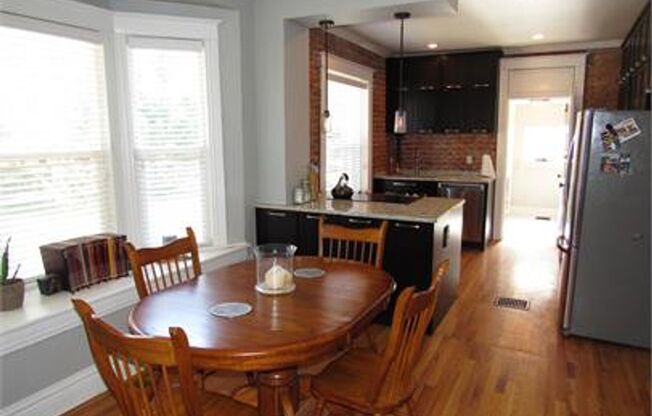 Remodeled & updated 3 bed 2 bath rowhome in the heart of Five Points!