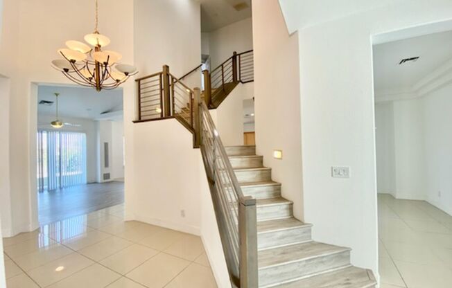 GORGEOUS QUEENSRIDGE COMMUNITY GUARD GATED 2 STORY HOME