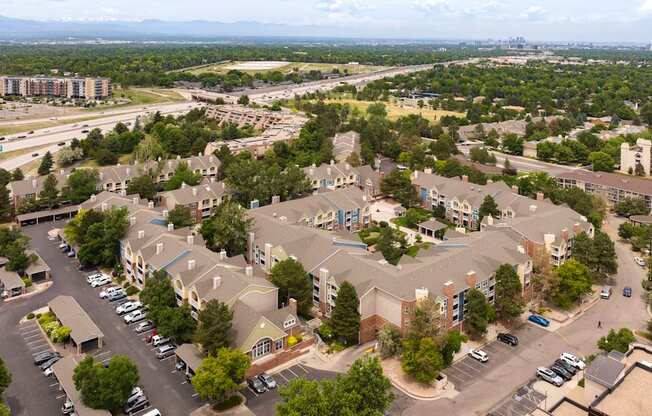 an aerial view of an empty parking lot in a city