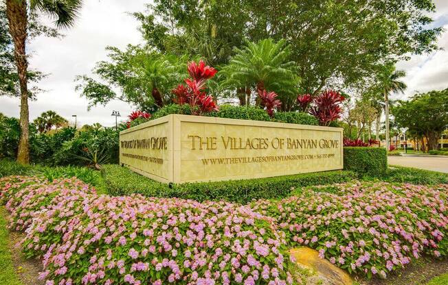 Entrance sign at The VillagesApartment  of Banyan Grove Apartments in Boynton Beach FL