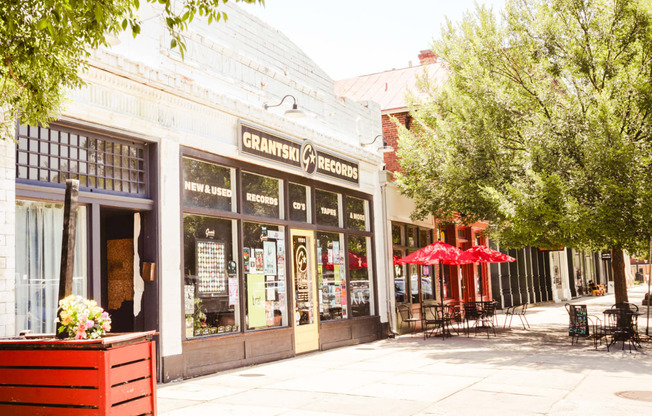 a street view of a coffee shop on a city street