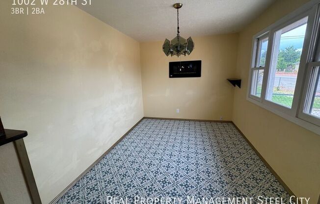 1002 W 28 ST
