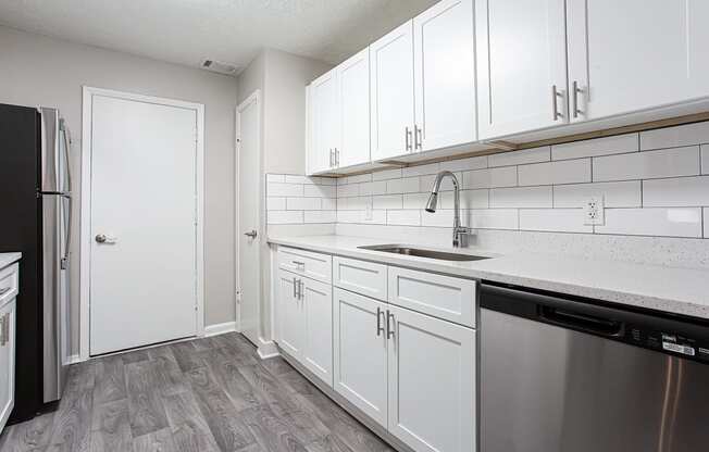 Gourmet kitchen with wood like flooring at Parkside at Sandy Springs Atlanta, GA