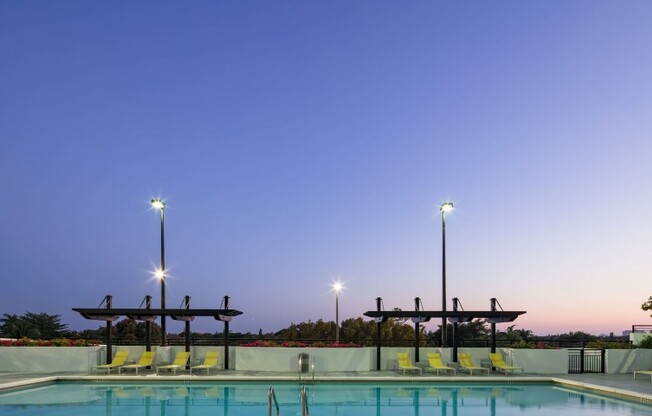 Pool at night outside Miami Florida apartments.