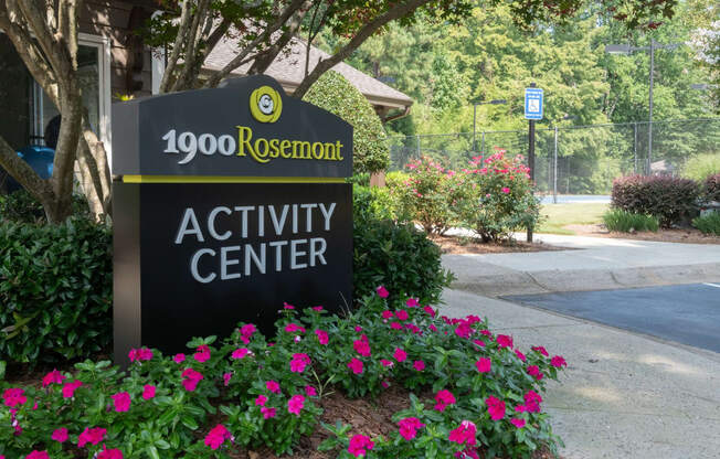 the sign for the activity center at the 1600 rosemont apartments