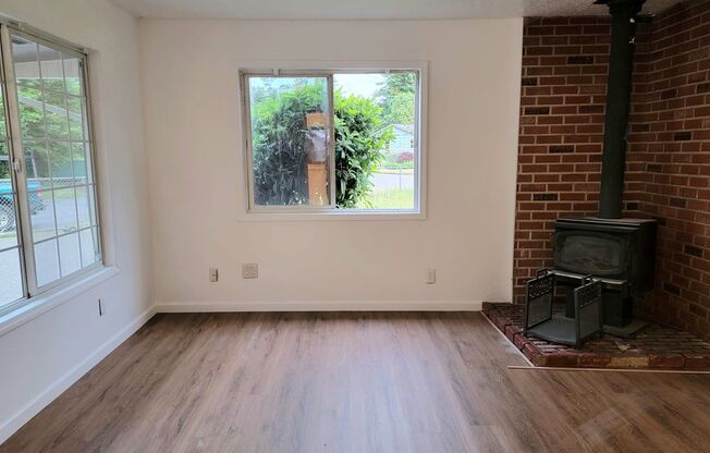 Freshly renovated, bright, and spacious, on an extra large corner lot!!