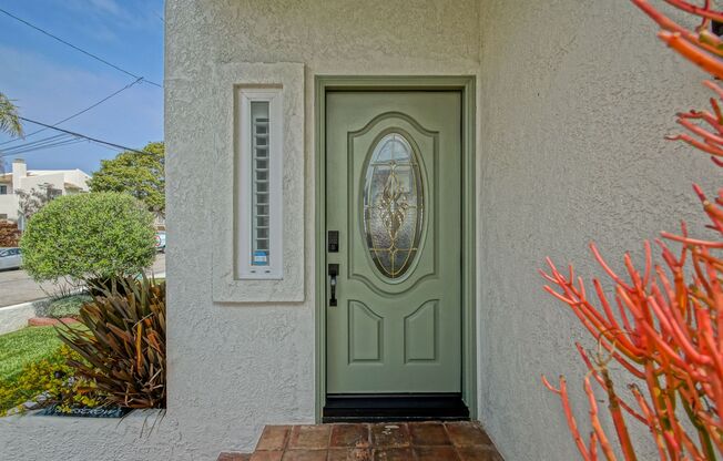 Beautifully Remodeled, Detached Front Townhome w/ Amazing Dual Open Living Spaces, Incredible Outdoor Space & 2-Car Garage Just Blocks to Schools, Shopping & 2 Mins to Beach!