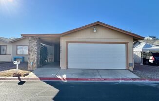 ADORABLE 2 BEDROOM 2 BATHROOM TOWNHOUSE WITH A 2 CAR GARAGE