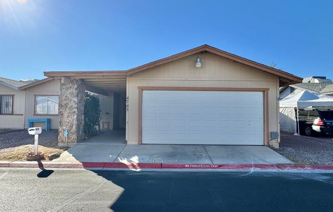 ADORABLE 2 BEDROOM 2 BATHROOM TOWNHOUSE WITH A 2 CAR GARAGE