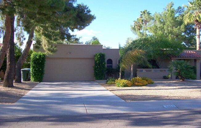 GORGEOUS 3 BEDROOM, 2 BATHROOM HOME WITH PEBBLE TECH POOL IN COVETED SCOTTSDALE LOCATION!