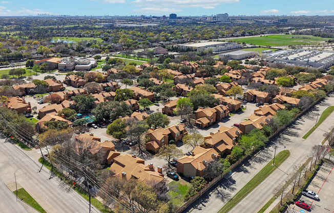 A residential area with houses and roads.