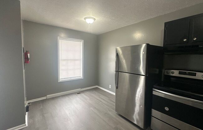 FIRST FULL MONTHS RENT FREE!! 2 Bedroom Duplex with Huge Back Yard!