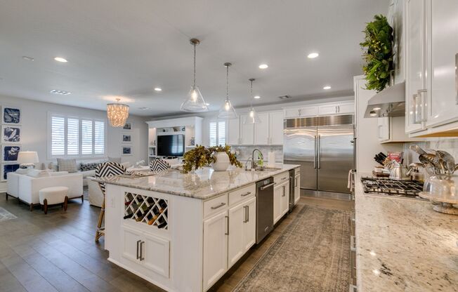 FULLY FURNISHED- Elegant 4-Bed, 3.5-Bath Home with Loft, Designer Finishes, and Expansive Backyard