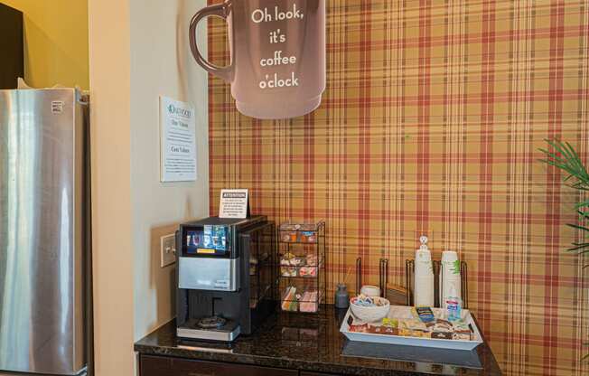 a coffee shop with a coffee cup on the wall