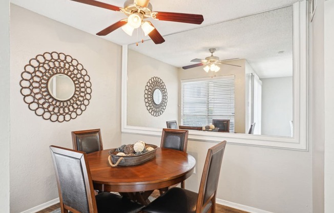 Model A2 floor plan dining room with a table and ceiling fan Noel on The Parkway in Dallas, TX