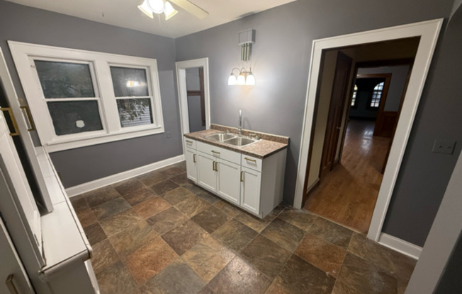 ✨ Updated 4BR/2BA Single-Family Home — Garage Parking, Water & Lawn Care Included ✨