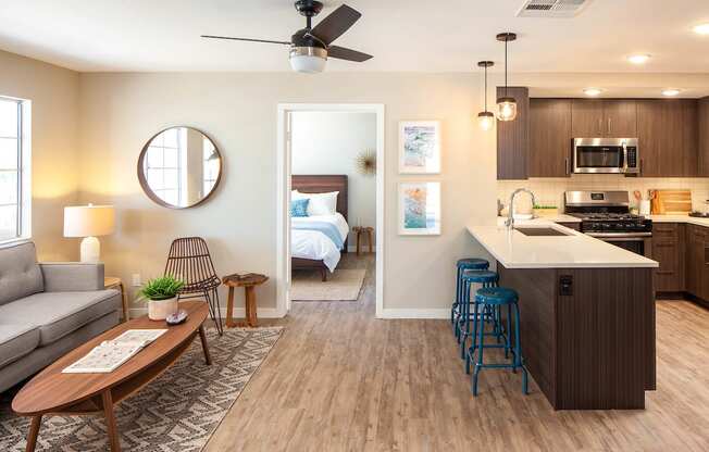 Living and kitchen area with entry to bedroom at Driftwood, San Diego, CA