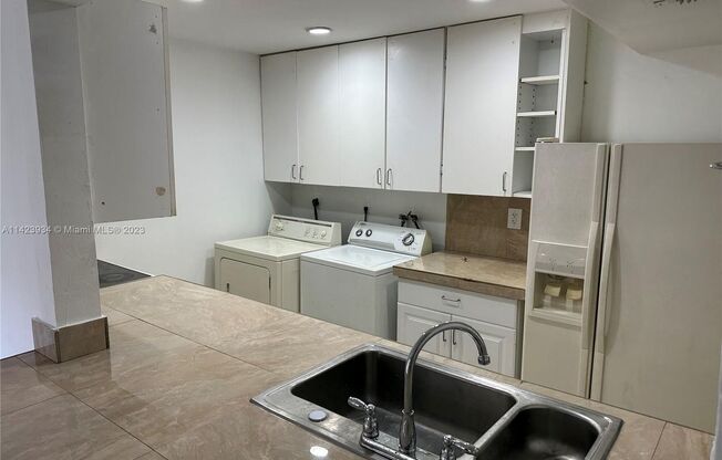 3 bedroom 1.5 bath townhome. Private fenced back yard,