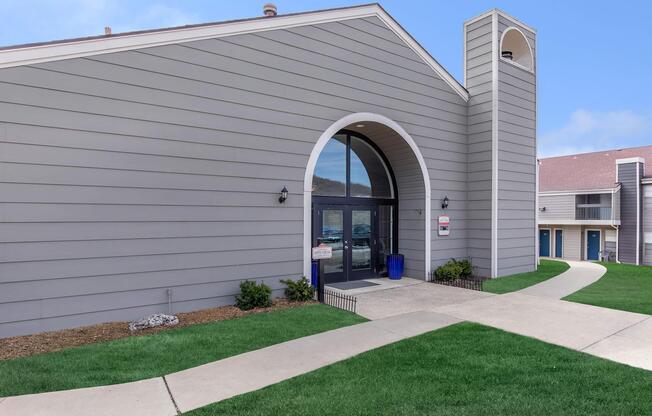 a large lawn in front of a building