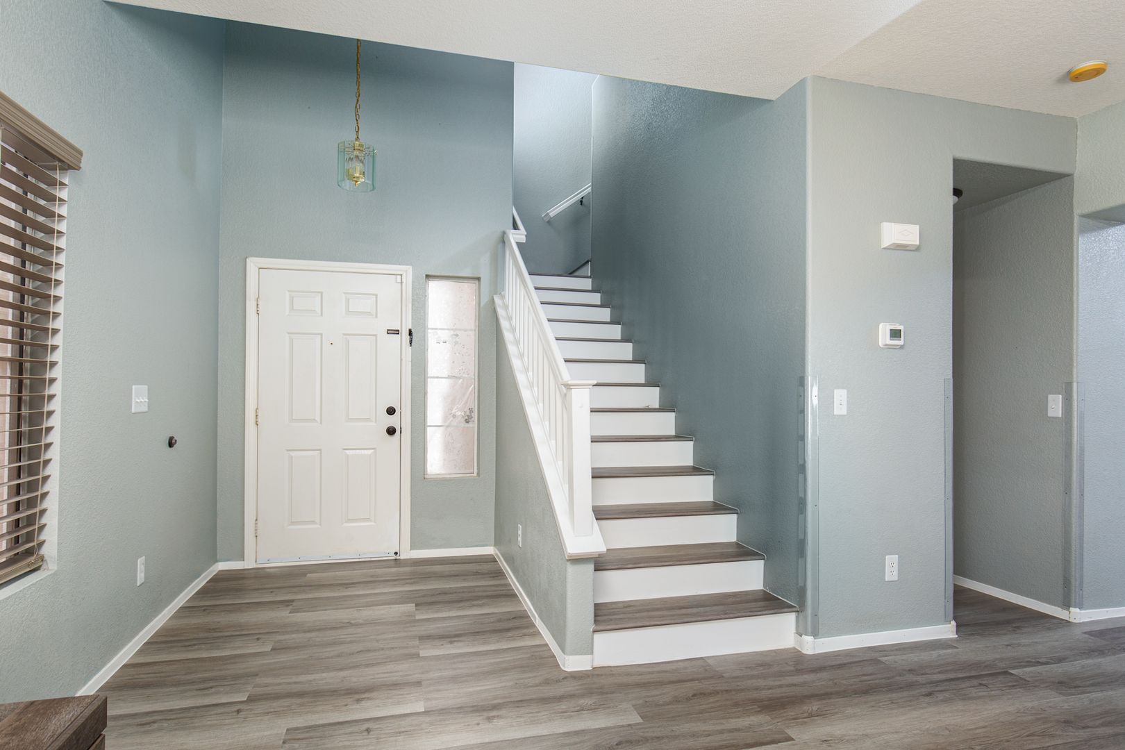 3 bedroom home located near 215 Freeway and shopping.