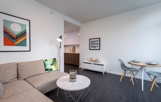 a living room with a couch and a table