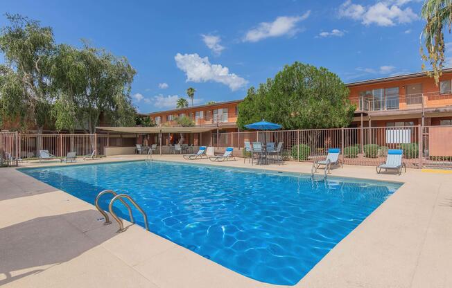 a pool next to a body of water