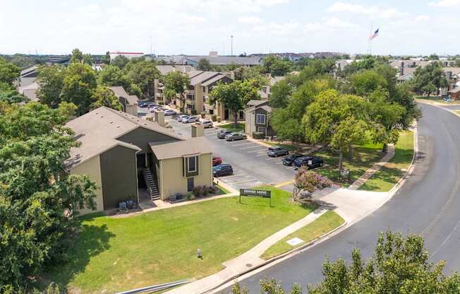 A residential area with houses and a road.
