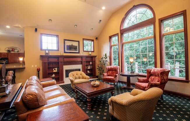 luxurious, rich, clubhouse with fireplace and comfy sitting area