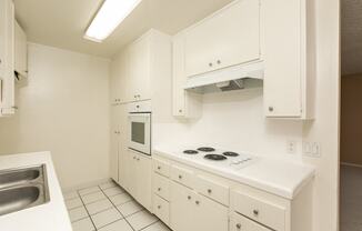 Kitchen with White Appliances and White Cabinets