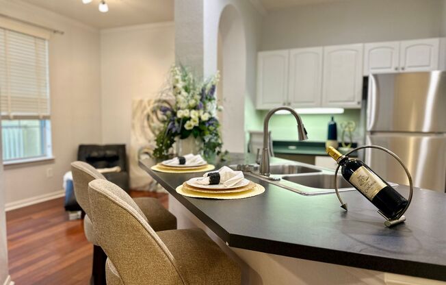 FULLY FURNISHED with King Bed-Pool View 1brm 1ba with inside full size laundry- Utilities included!