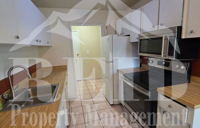 ADORABLE CENTRALLY LOCATED CONDO