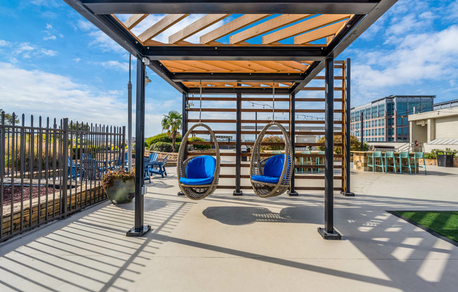 Community sitting area on pool pavilion on sunny day