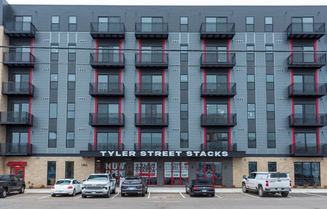 a screenshot of a building with cars parked in it