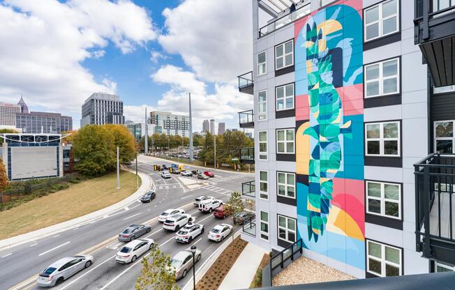 The bold exterior mural at Modera Westside Trail adds a creative presence, connecting the building’s design to the surrounding Atlanta streetscape.