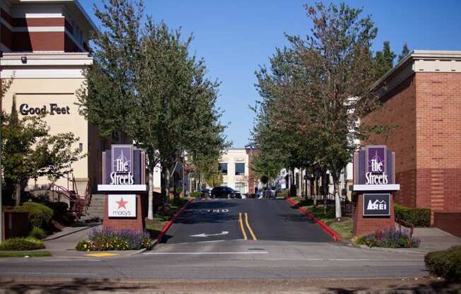 Sunset Crossing Apartments exterior street and sign