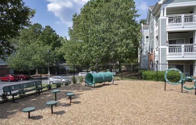 our apartments have a playground and a picnic table