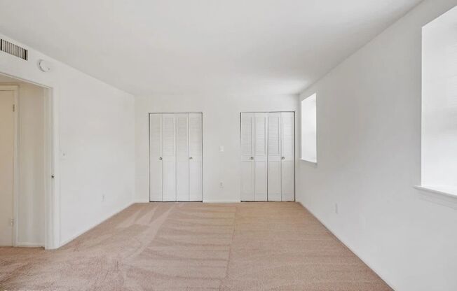 Bedroom with two closets